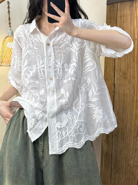 Camicia da donna con colletto rovesciato e ricamo floreale artistico