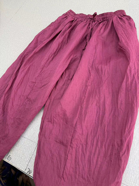 Pantaloni vintage autunnali larghi in ramiè con risvolto da donna